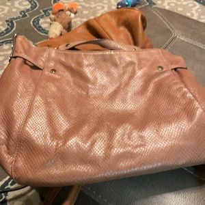 Michael Kors light tan shoulder bag with tassel